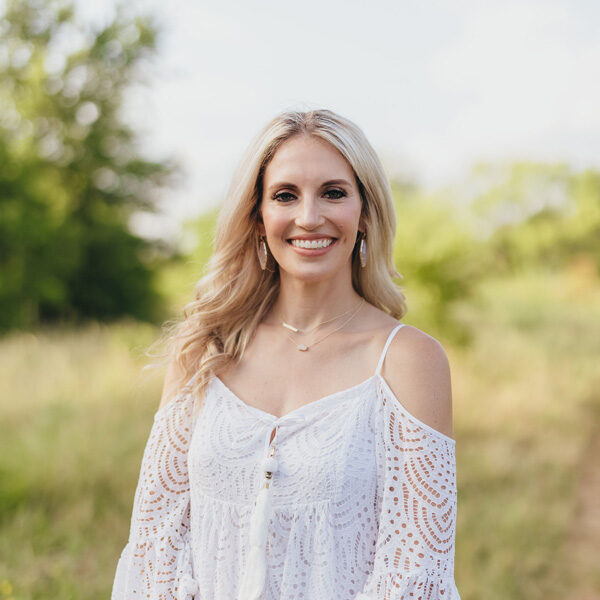 Fort Worth Texas dentist Rhiannon B Presley D D S smiling outdoors