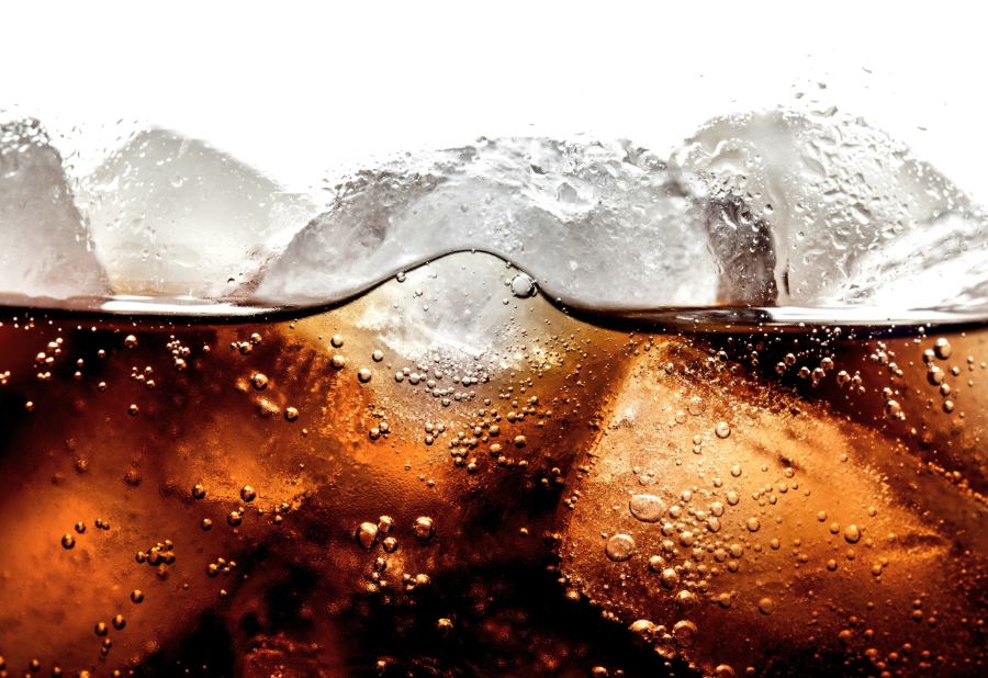 Close up of fizzy cola with ice